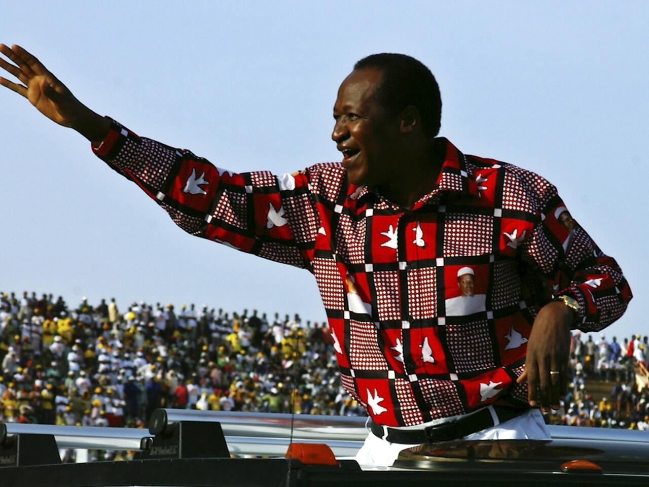 File photo of Burkina Faso's President Compaore waving to supporters in Ouagadougou