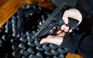 Canada's government introduces legislation to implement a "national freeze" on the sale and purchase of handguns