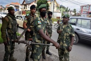 Congolese soldiers are seen outside the governor's headquarters as the new military governor arrives to take charge in Goma, North Kivu province