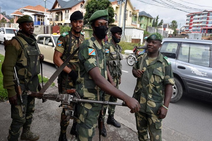 Congolese soldiers are seen outside the governor's headquarters as the new military governor arrives to take charge in Goma, North Kivu province