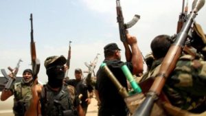 Shiite Muslim fighters from the Saraya al-Salam (Peace Brigades), a group formed by Iraqi Shiite Muslim cleric Moqtada al-Sadr