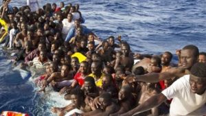 migrants-l-696x392